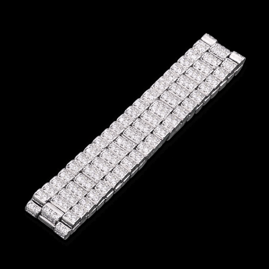 Close-up of white gold diamond presidential bracelet with micro pavé hand-set stones